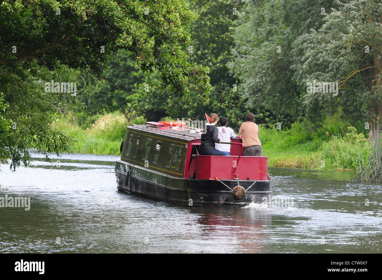 A narrow boat on the River Wey Navigations Surrey UK Stock Photo