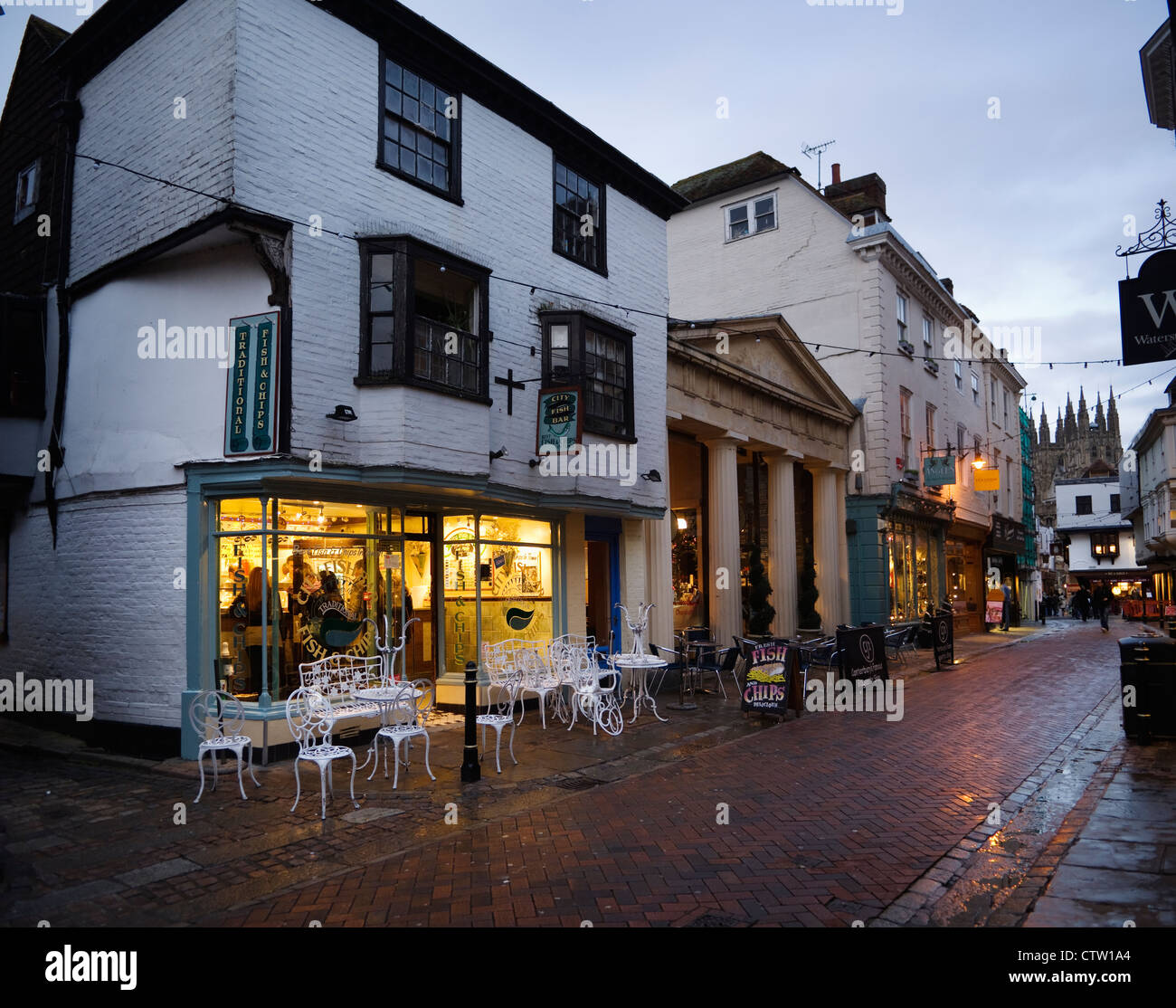 View of 'City Fish Bar' on St Margarets Street in Canterbury in the evening. Stock Photo