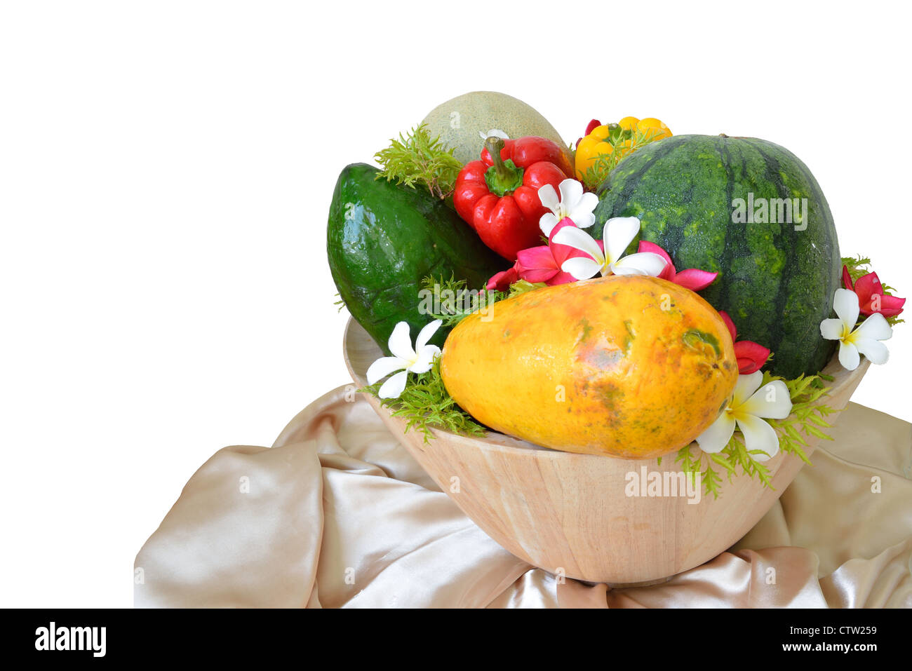 Decoration fruit with flower and vegetable in the wooden bowl and isolated on white background. Stock Photo