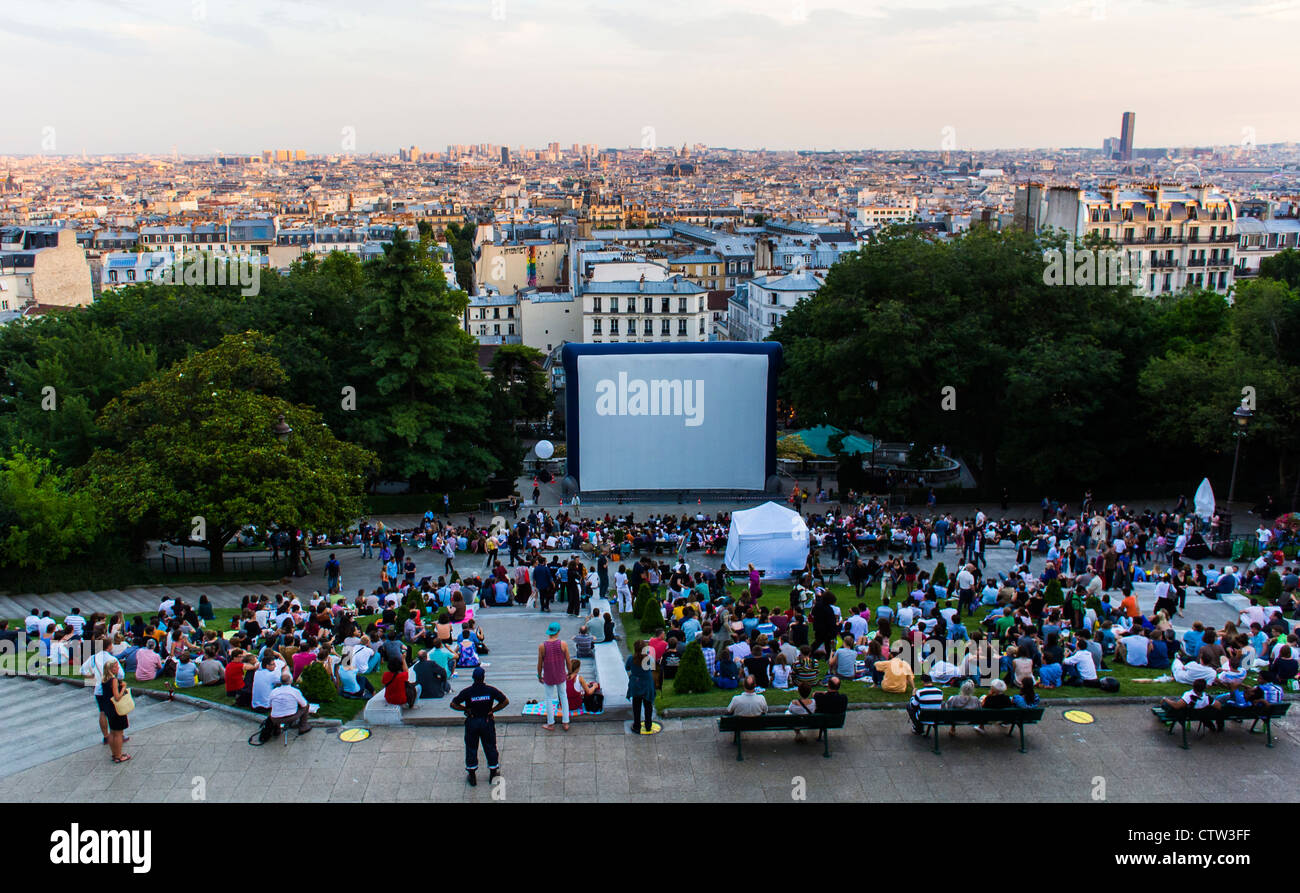 Paris, France, Open Air, Audience at Outdoor CInema Show, 'Forum des Images', in the Butte Montmartre Park, people at the movies Stock Photo