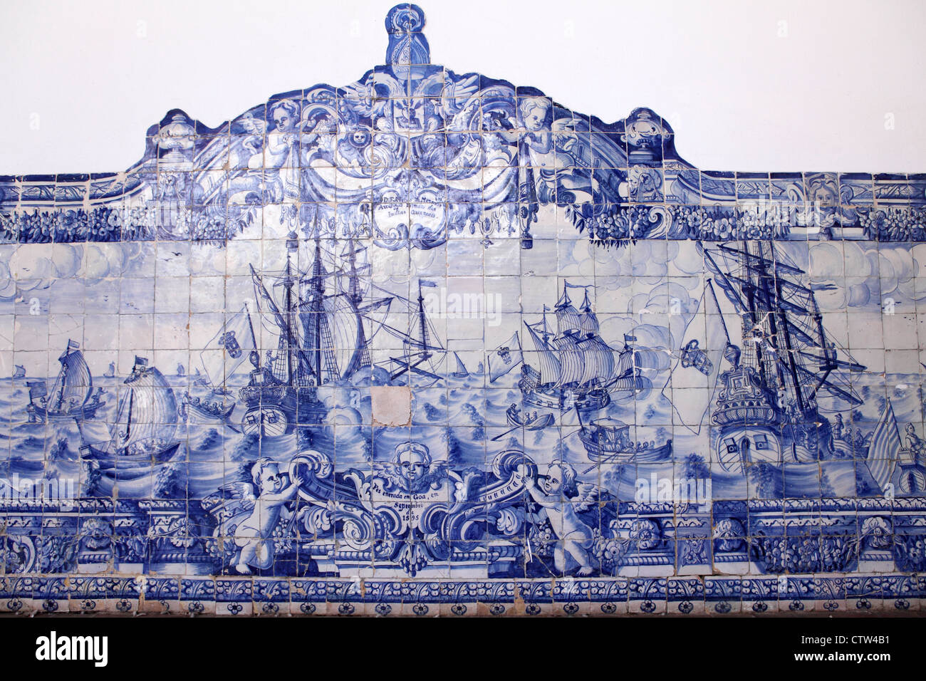 A depiction of Portuguese ships entering Goa on Azulejo tiles in Torres ...