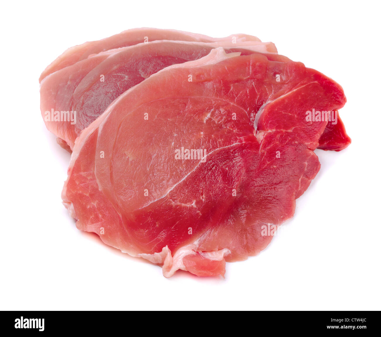 Three raw fresh juicy pork steaks isolated on white Stock Photo