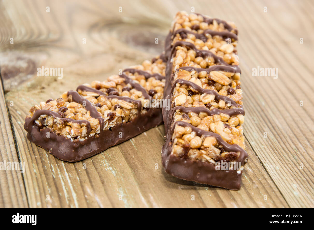 Download Chocolate Muesli Bars On Wooden Background Stock Photo Alamy Yellowimages Mockups