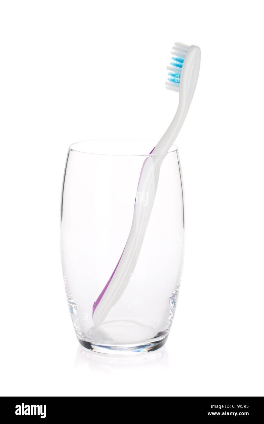 Two toothbrushes in a glass. Isolated on white background Stock Photo ...