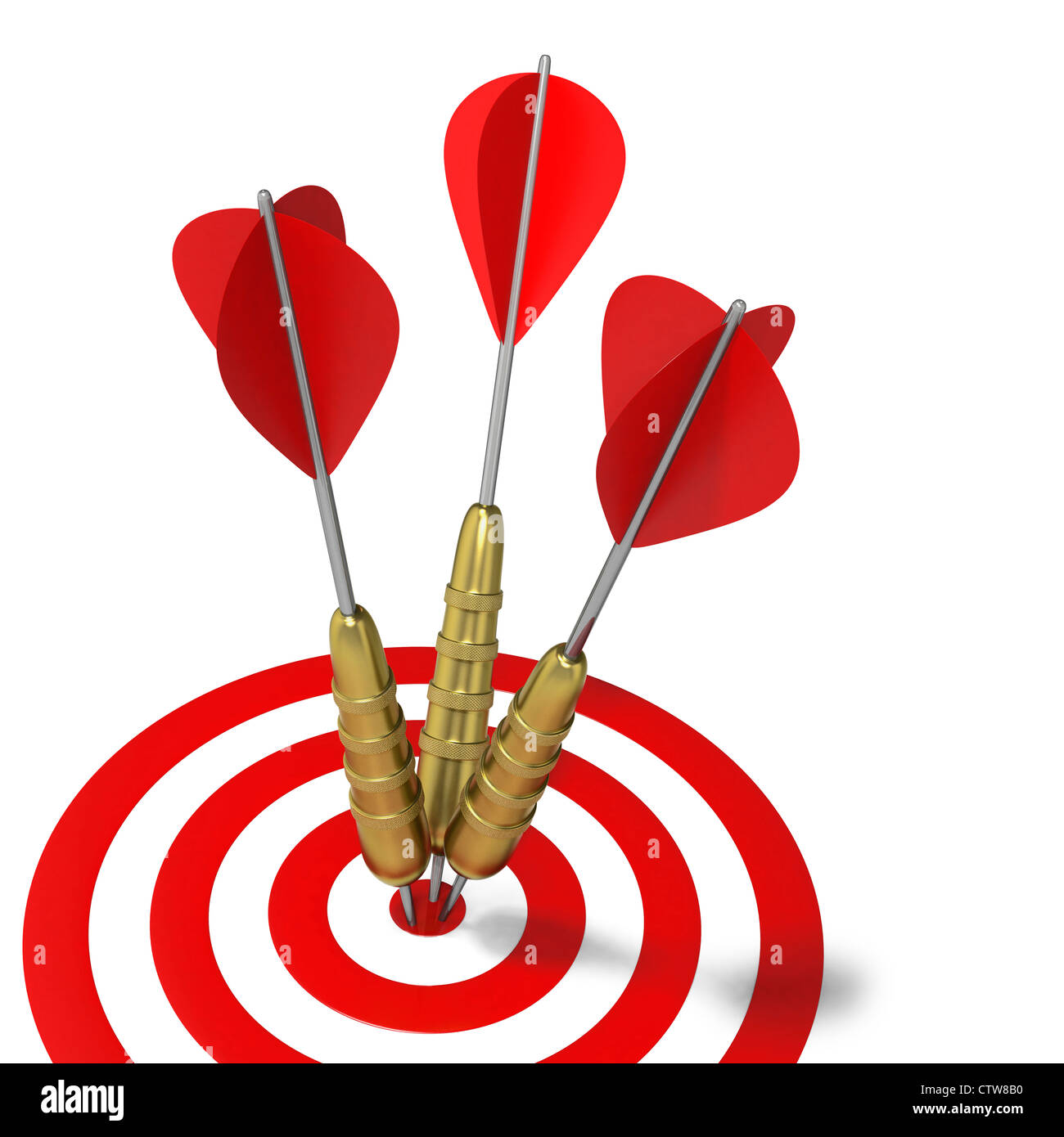Three darts hitting the center mark on target or bulls eye Stock Photo