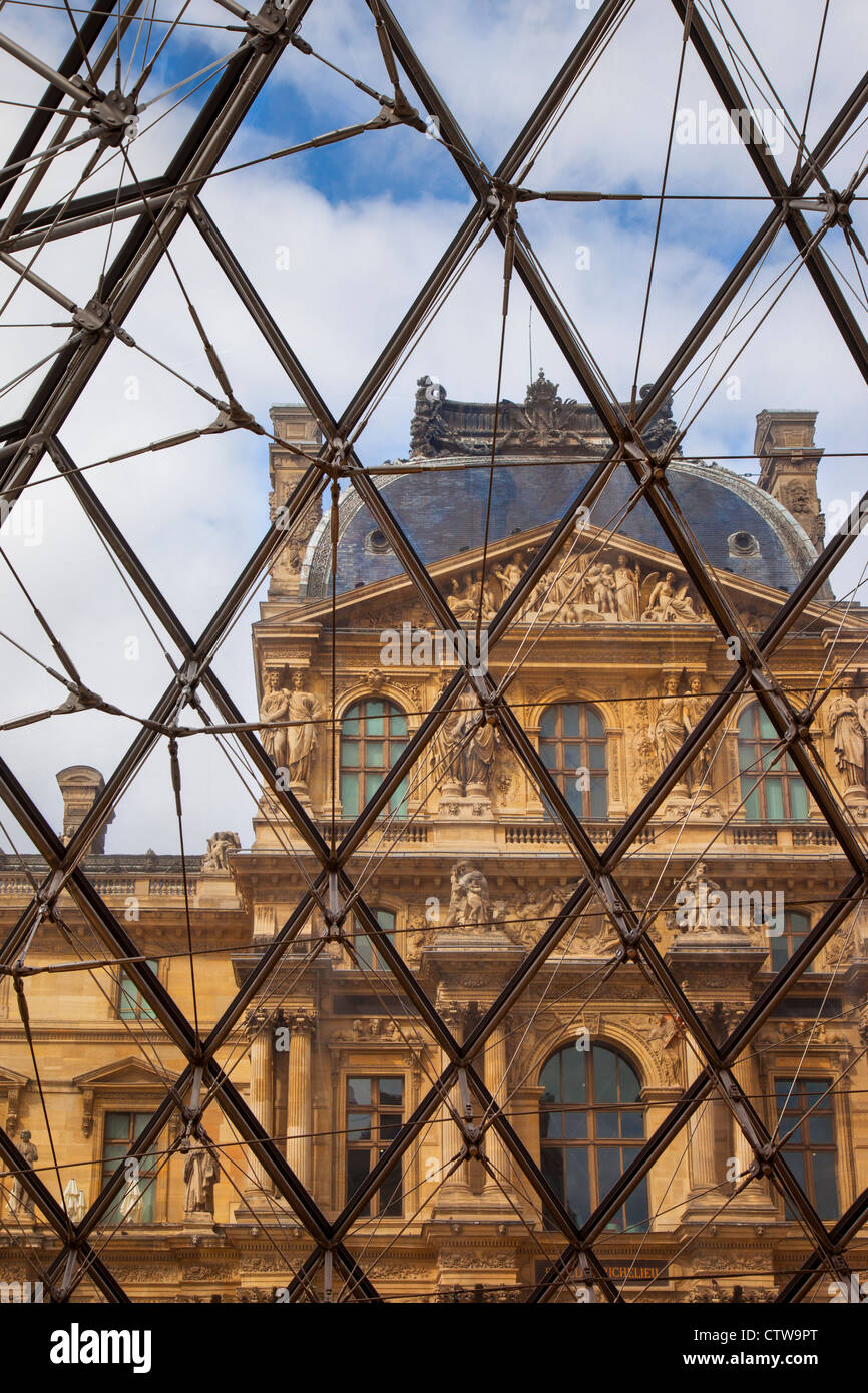 View through the Glass Pyramid to Musee du Louvre, Paris France Stock Photo
