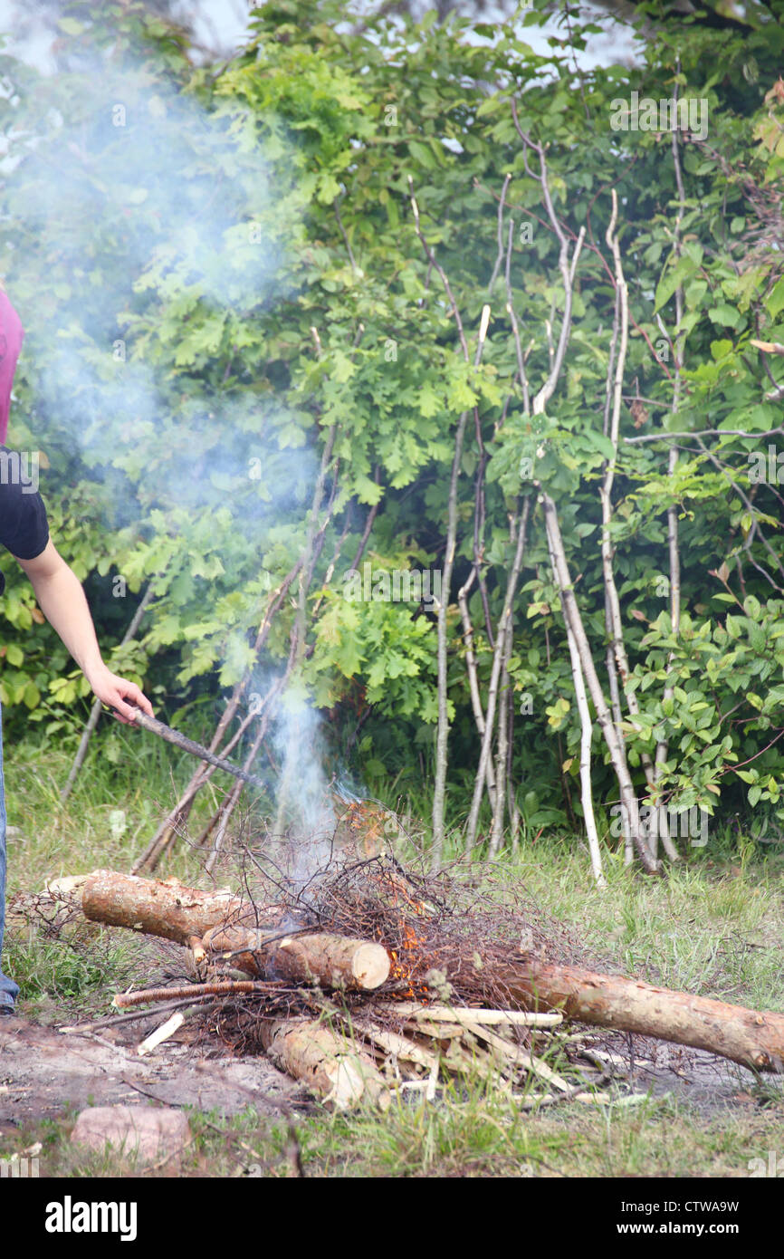 bonfire, campfire in the summer forest Stock Photo - Alamy