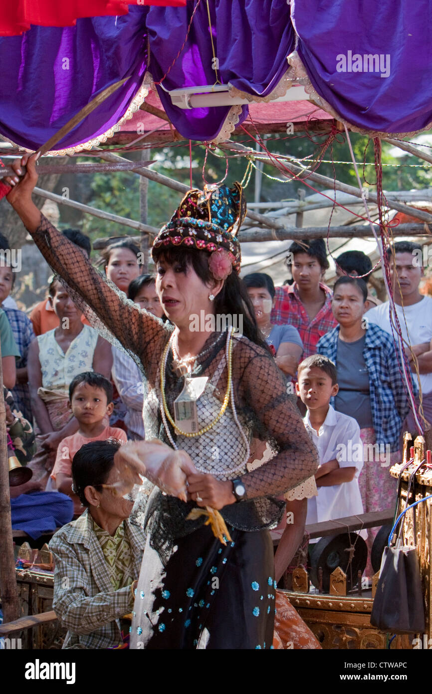 Myanmar, Burma. Bagan. Dancer at a Nat Pwe Celebration, giving thanks for a year of good fortune. Stock Photo