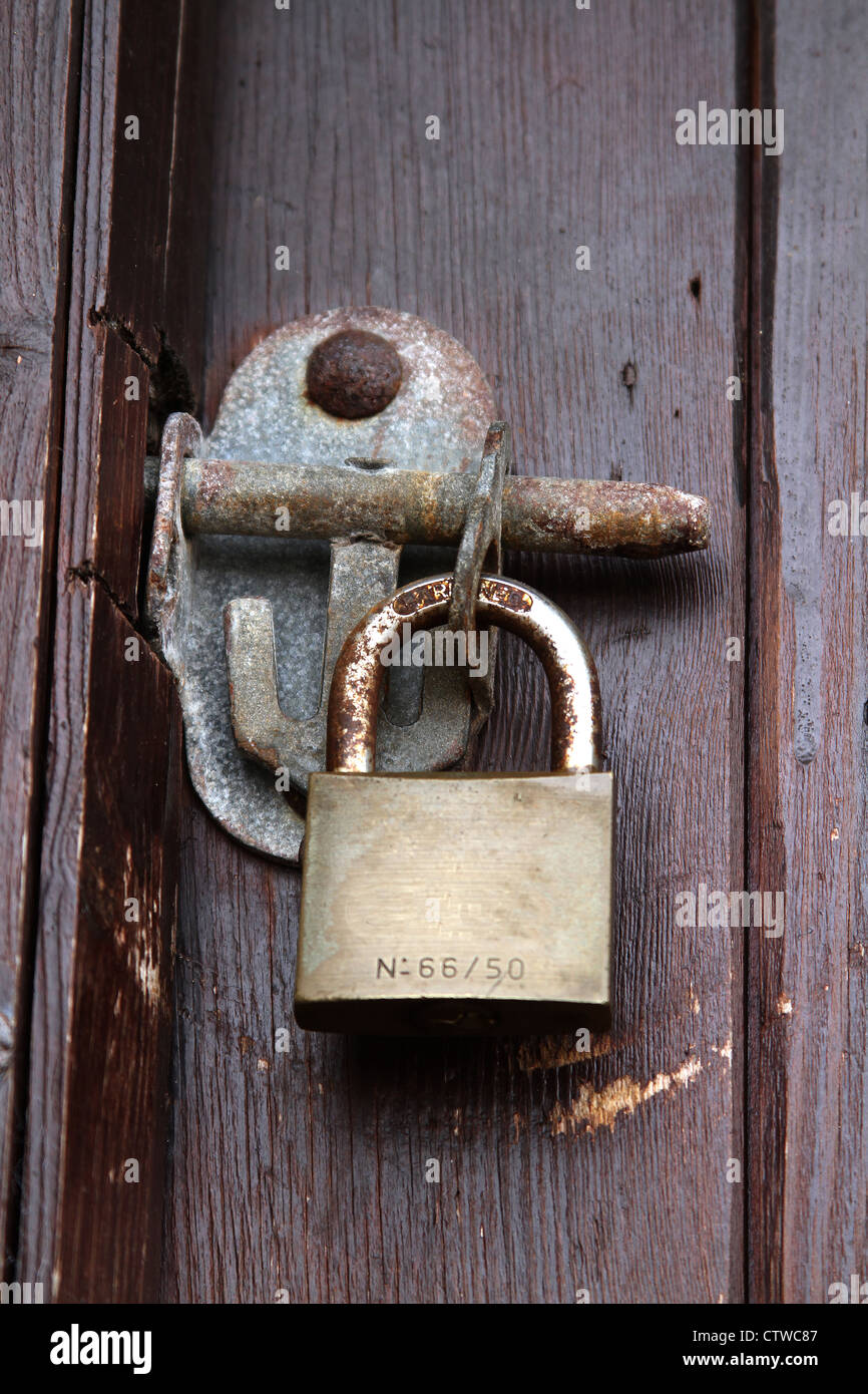Padlock on door Stock Photo Alamy