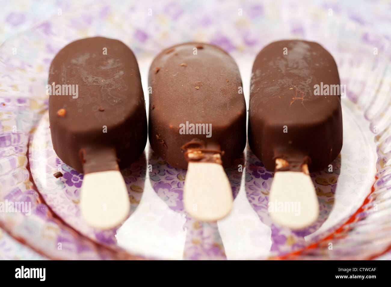Close-up of delicious ice-cream sticks with chocolate coating Stock Photo