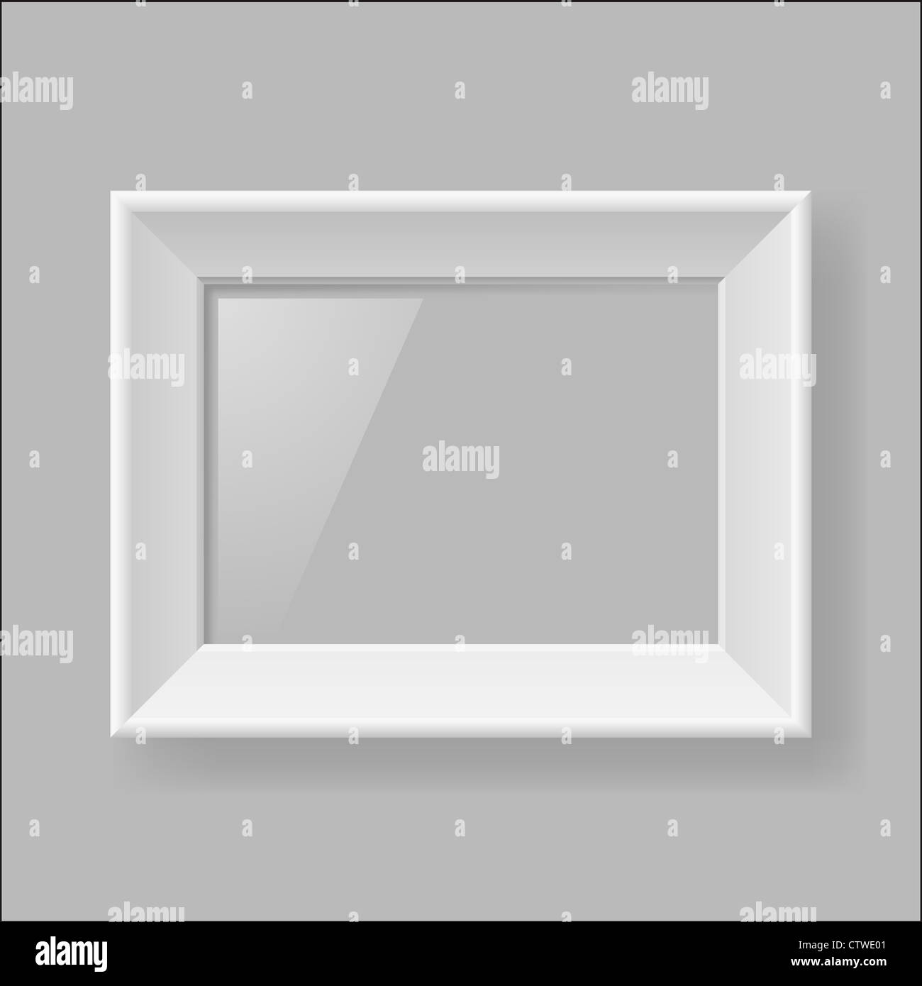 Blank white frame hanging on gray wall Stock Photo - Alamy