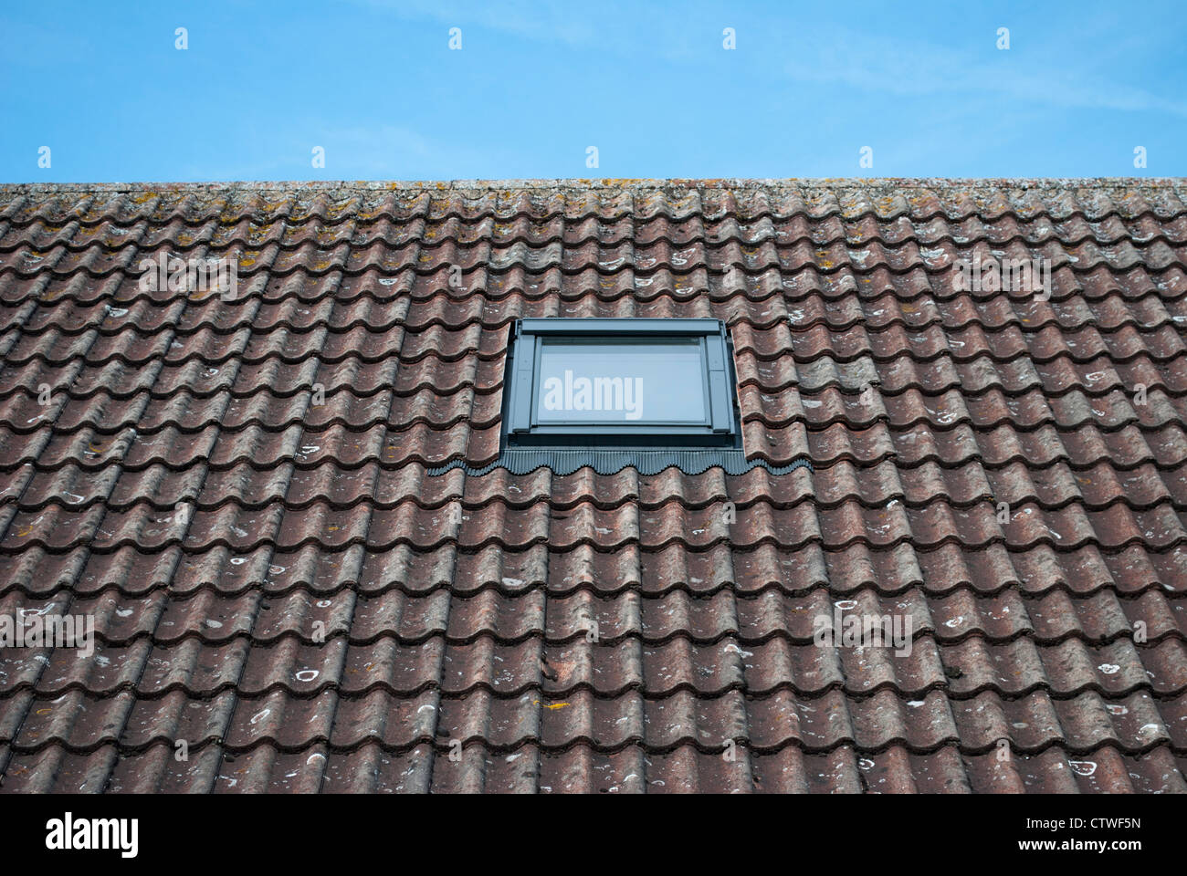 Velux skylight window in a tiled roof against a bright blue sky Stock Photo Alamy Velux skylight window in a tiled roof against a bright blue sky Stock Photo Alamy