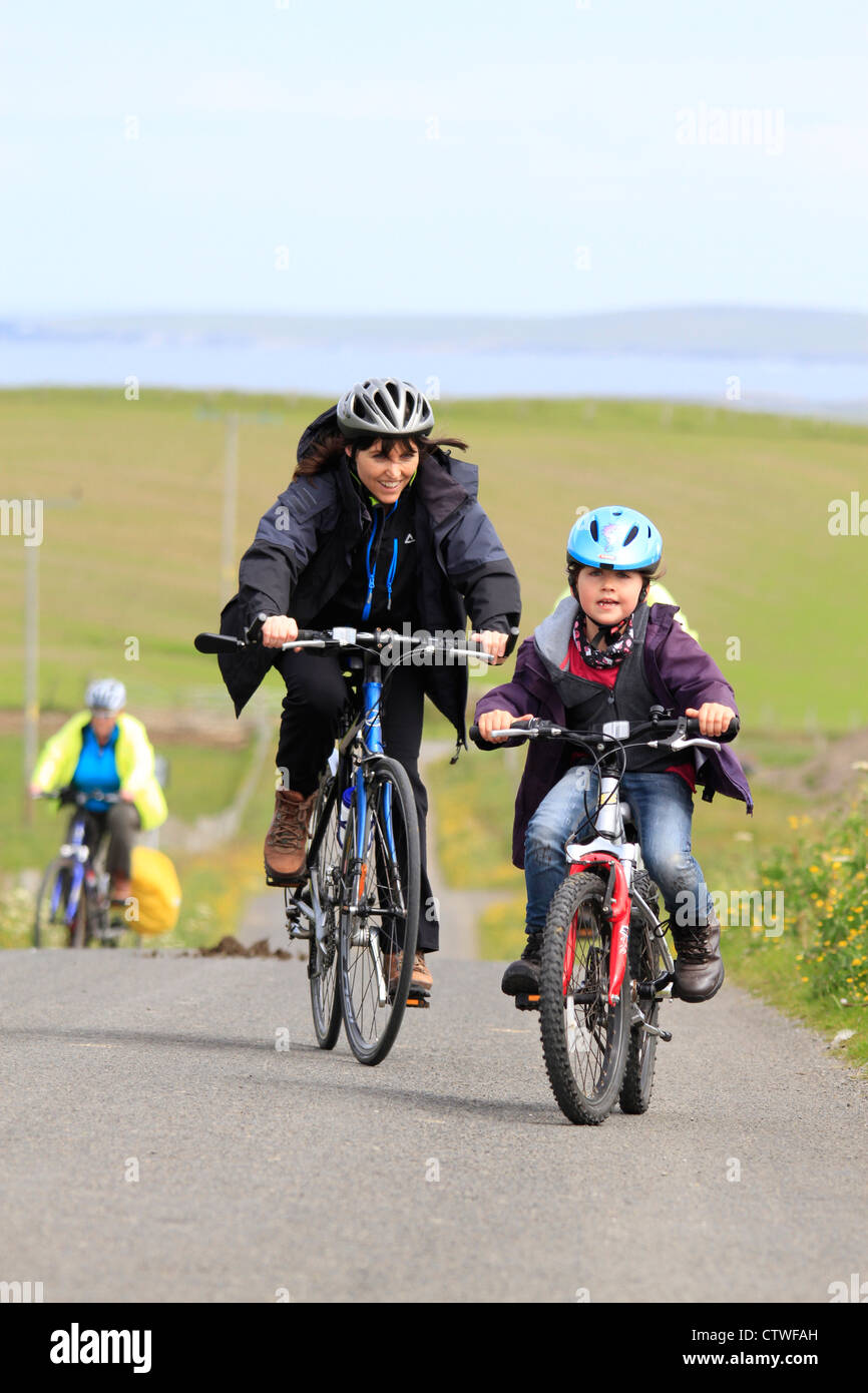 Family cycling, Orkney Islands Stock Photo