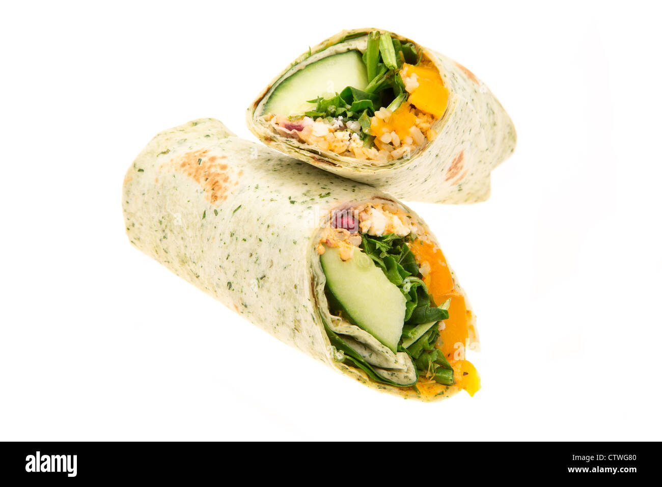 Roasted butternut squash and feta cheese wrap sandwich - studio shot with a white background Stock Photo