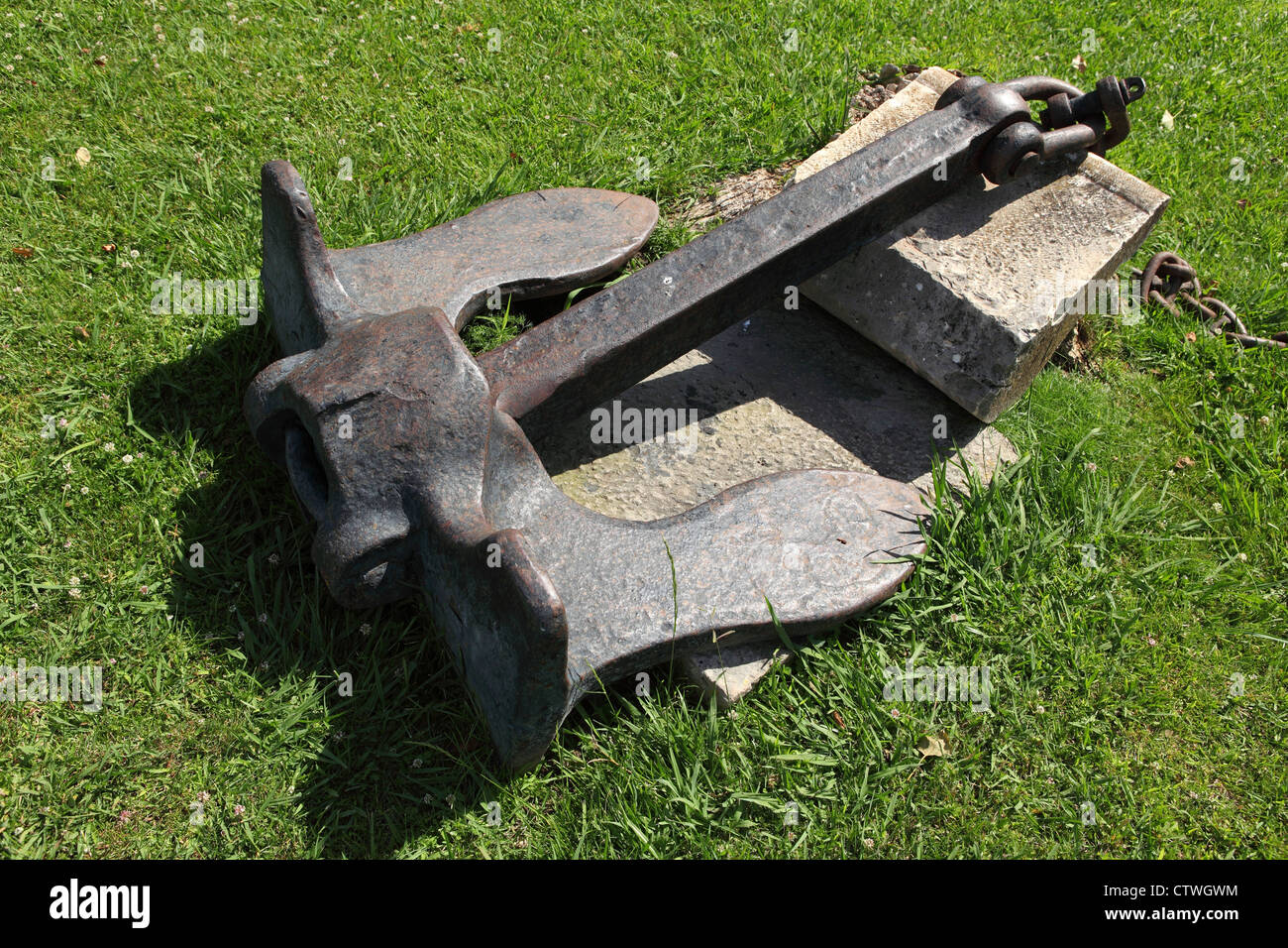 Anchor on grass outside of the National Maritime Museum, Belem, Lisbon, Portugal. Stock Photo