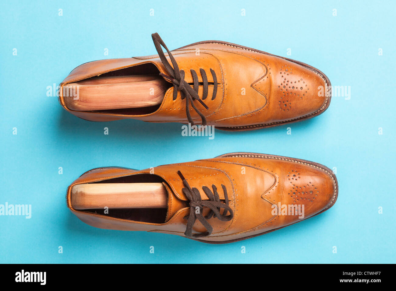 A pair of vintage mens brogue tan shoes viewed from above Stock Photo ...
