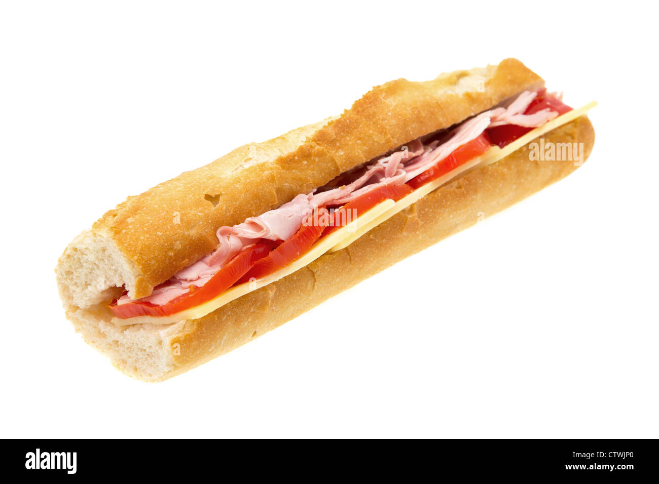 Baguette sandwich containing ham, cheese and tomato - studio shot with a shallow depth of field and white background Stock Photo