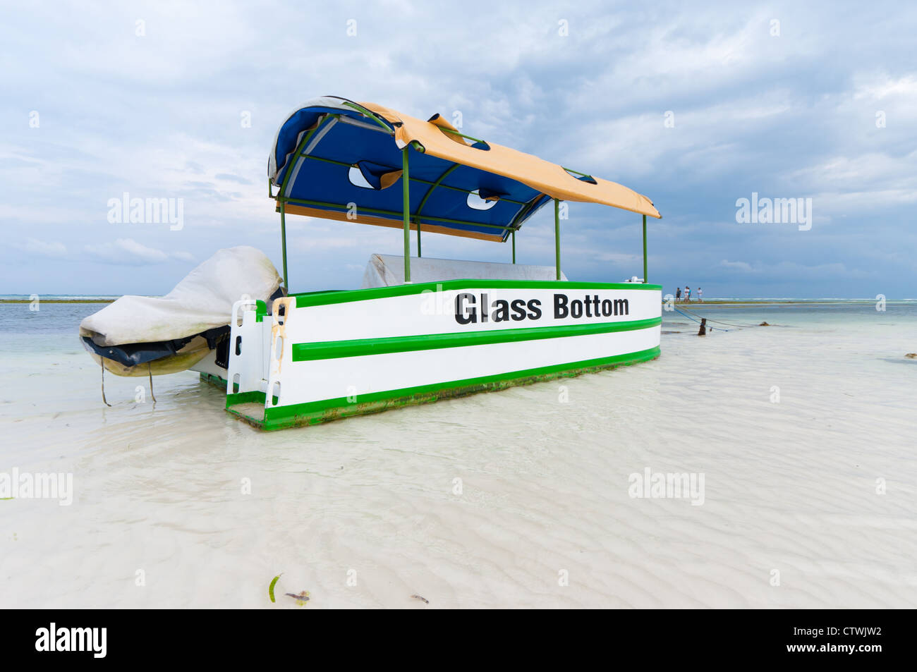 touristic glass bottom boat at low tide on a beach in Bohol, Philippines Stock Photo