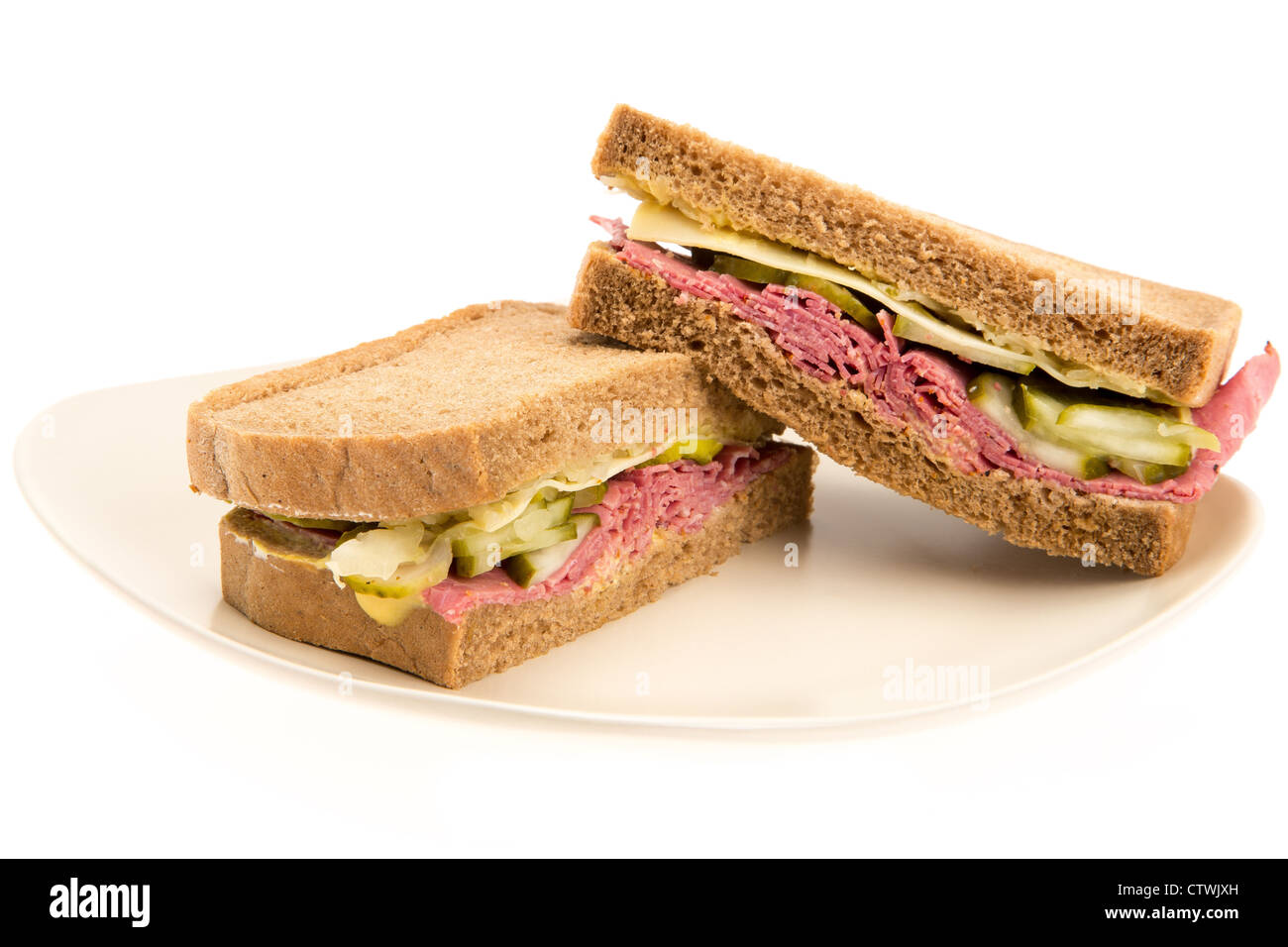 New York style Pastrami sandwich on rye bread studio shot with a