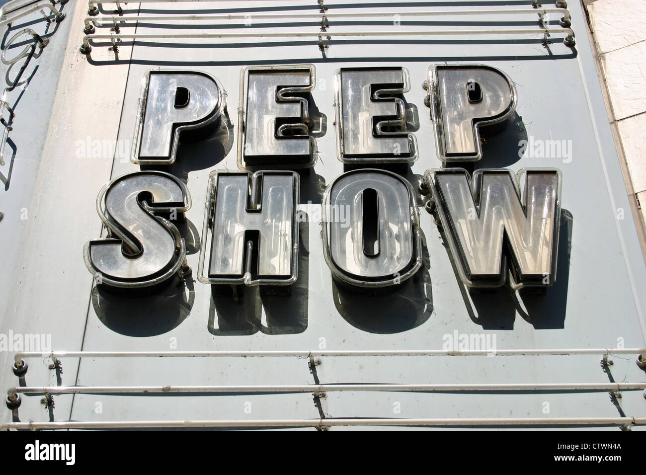 An unlit neon sign that reads Peep Show in Montreal, Quebec Stock Photo