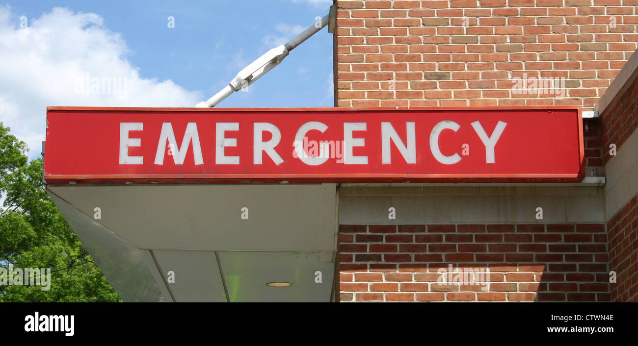 An Emergency sign above the entrance to an Emergency Room Stock Photo