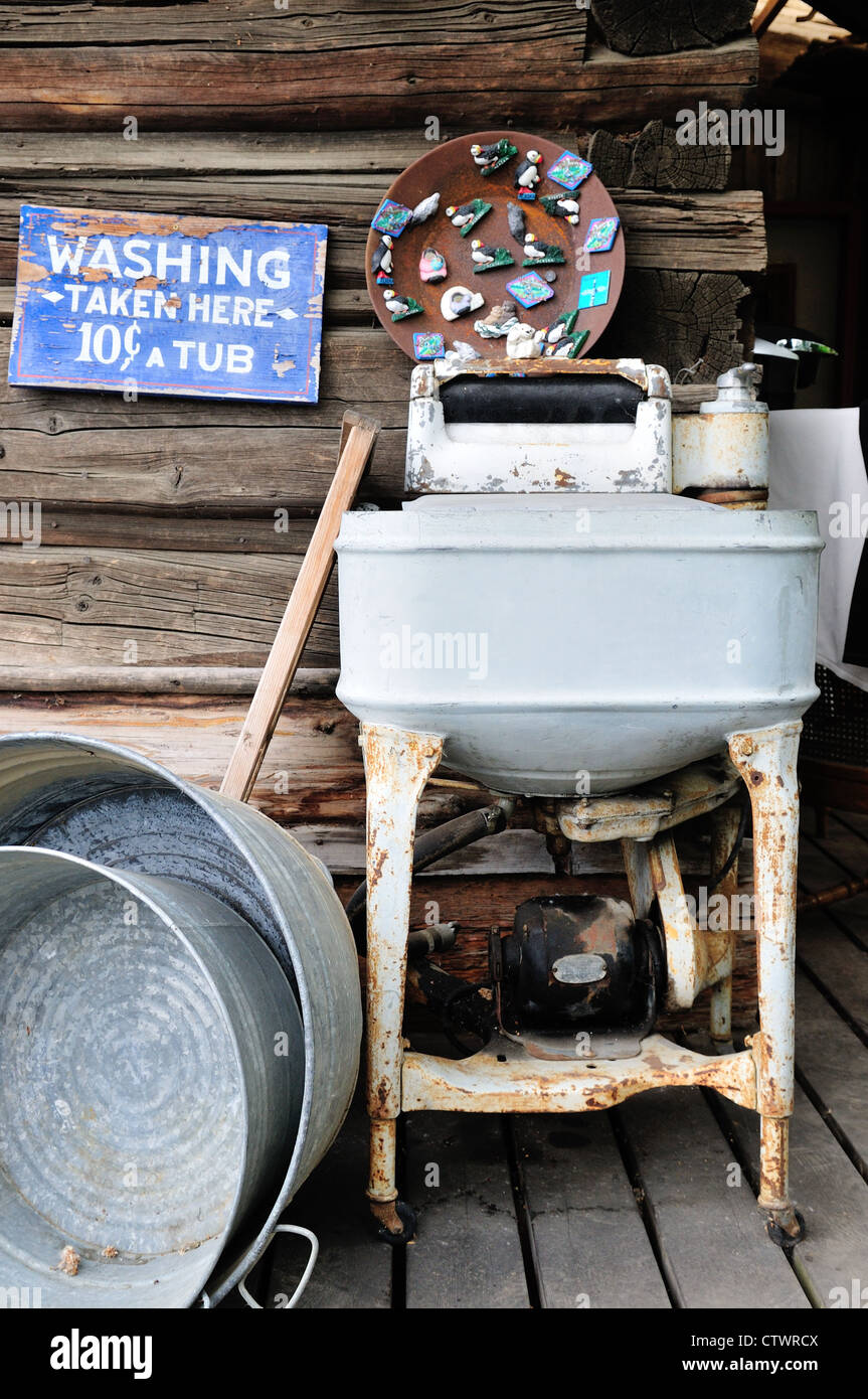 An old washing machine. Alaska, USA. Stock Photo
