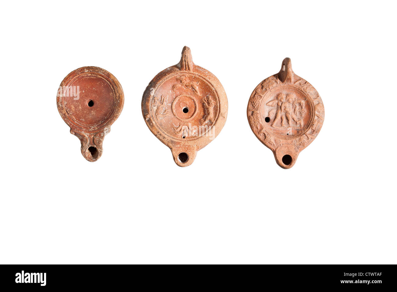 Three Roman era terracotta oil lamps 1st century CE (private collection) Stock Photo