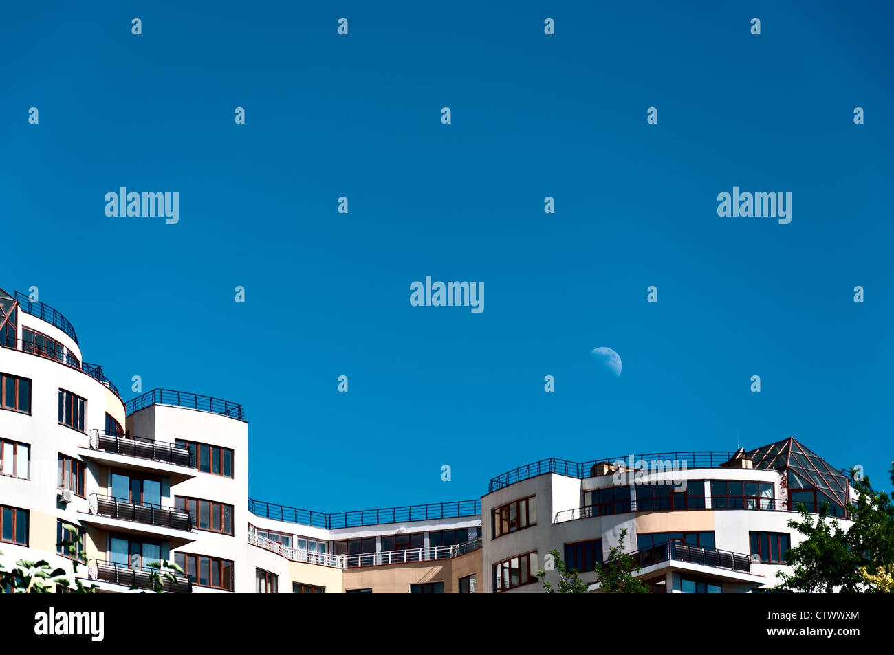 Modern house on a background of blue sky and the moon Stock Photo - Alamy