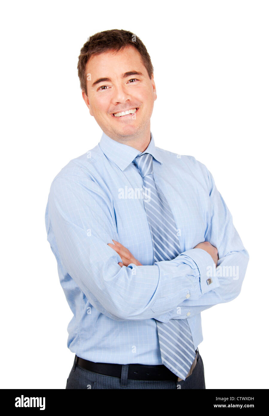 Smiling confident businessman with arms crossed on isolated background Stock Photo