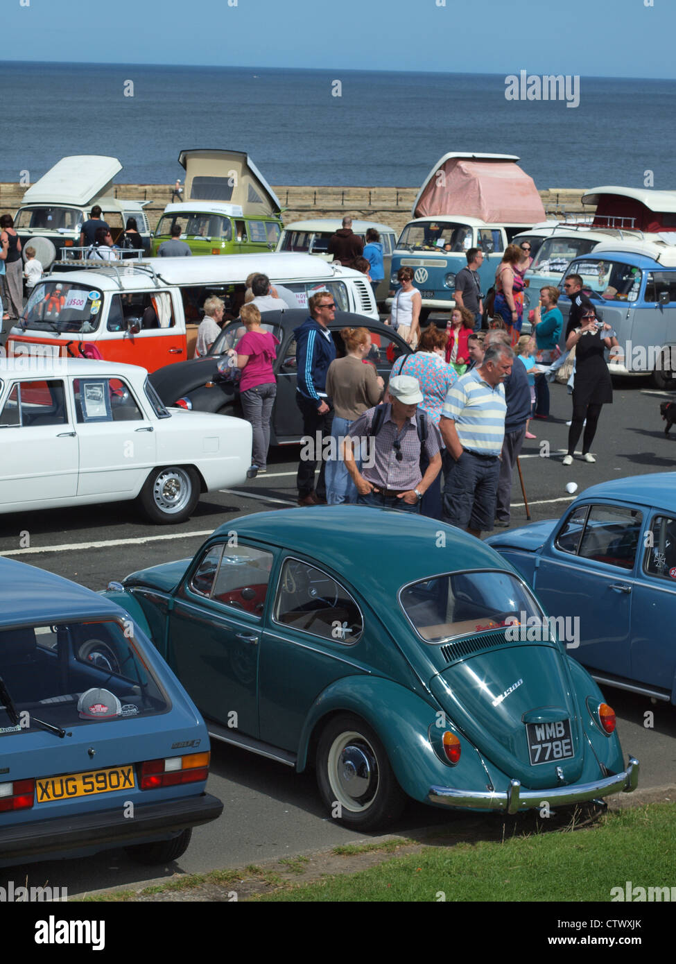 Crowds of people gathering at a vintage Volkswagen classic car and van festival in Northern England. Stock Photo