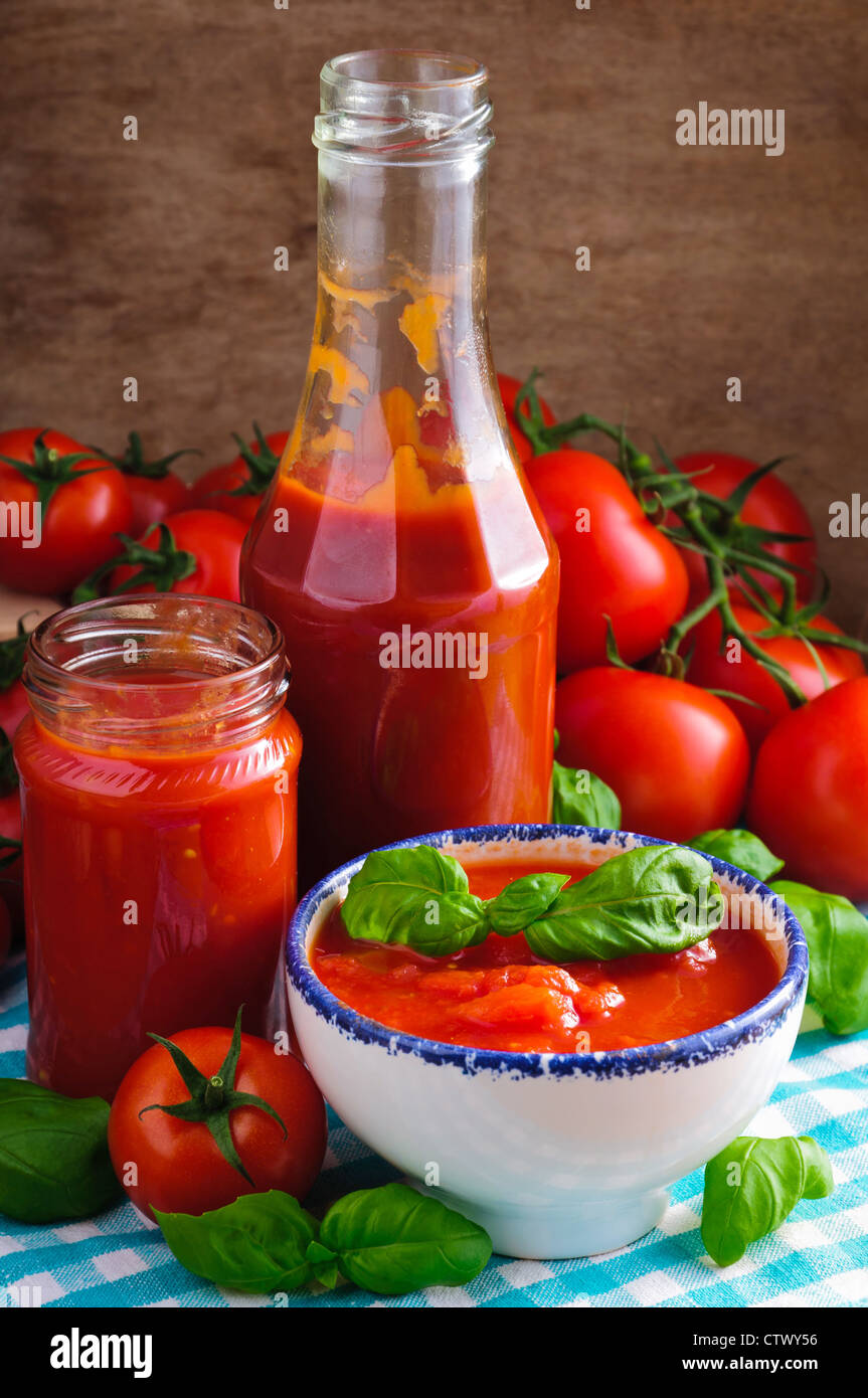 Still life with tomato sauce and ingredients Stock Photo