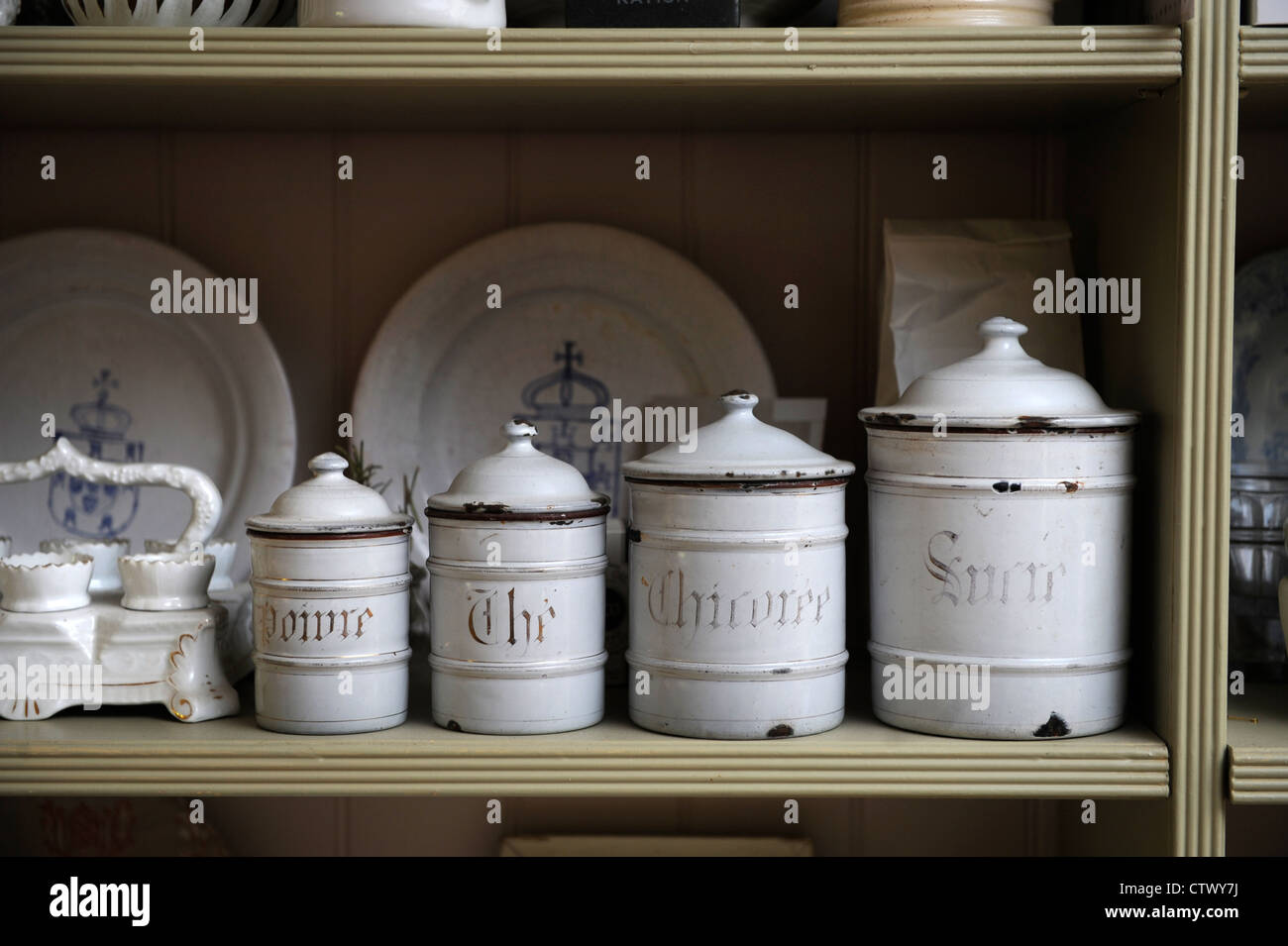 Traditional cottage kitchen interior with vintage storage jars UK Stock