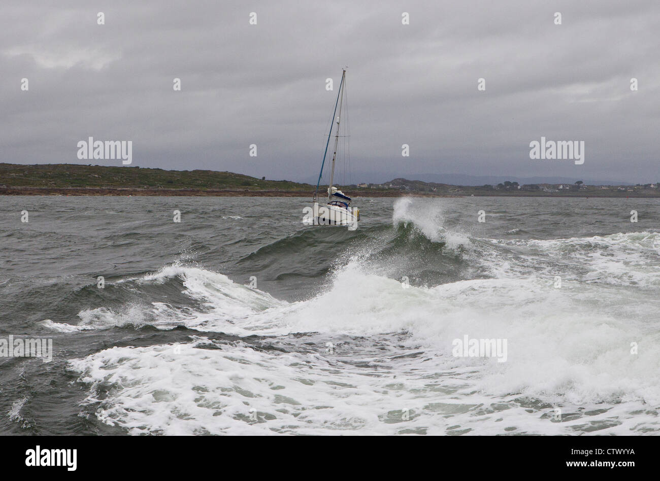 yacht in stormy seas Stock Photo