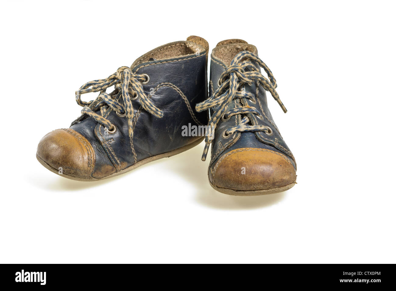 Blue baby leather shoes on a white background Stock Photo - Alamy