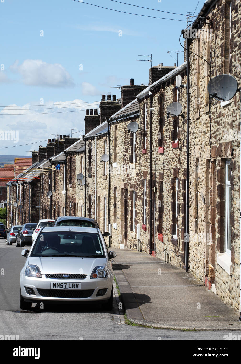 A row of stone built terraced houses within Consett, north east England