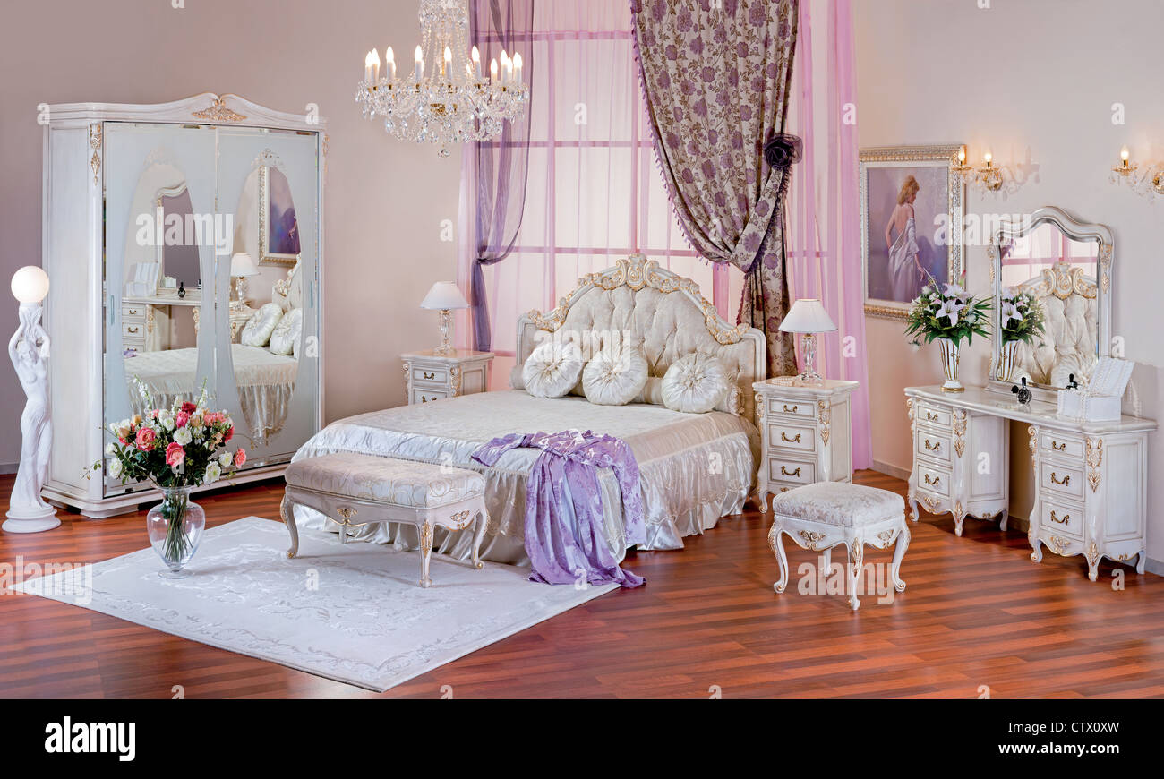White luxury bedroom in interior Stock Photo - Alamy