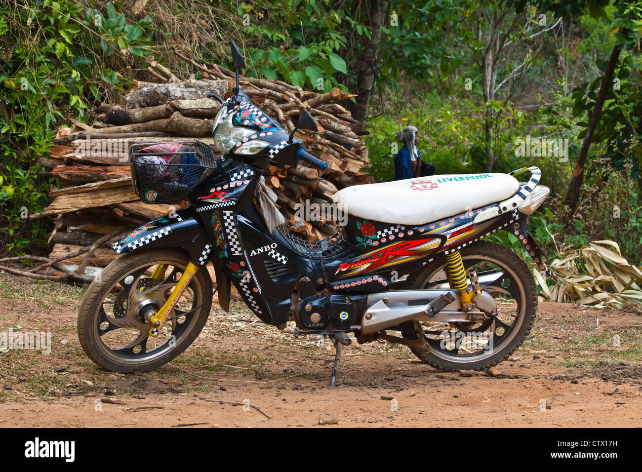 Small MOTORCYCLES have become a major form of transportation - KENGTUNG or KYAINGTONG - MYANMAR Stock Photo