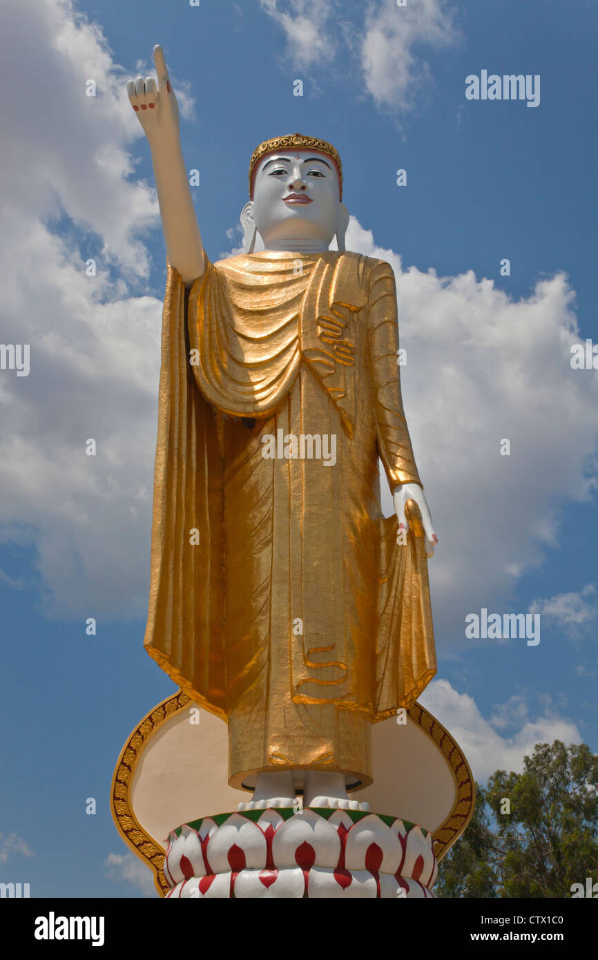 YAT THAW MU is a large standing BUDDHA STATUE overlooking KENGTUNG also known as KYAINGTONG - MYANMAR Stock Photo