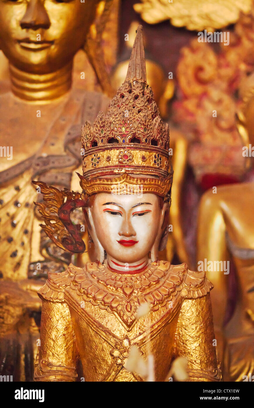 Ancient wooden BUDDHA STATUES in the main chapel of WAT JONG KHAM