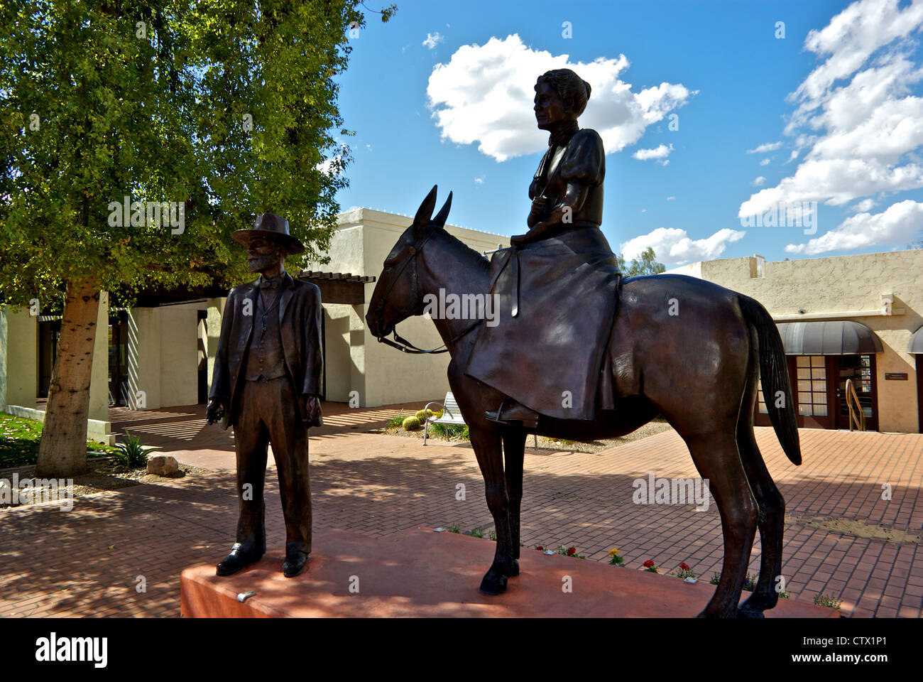 Cast bronze sculpture founder Windfield Scott wife mule Main Street Civic Square Old Town Scottsdale downtown Historic District Stock Photo