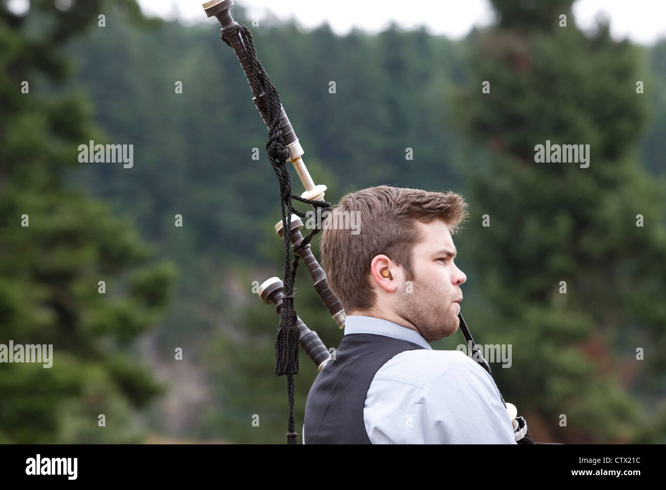 Bagpiper performing at the 66th Annual Pacific Northwest Scottish Highland Games and Clan Gathering - Enumclaw, Washington. Stock Photo