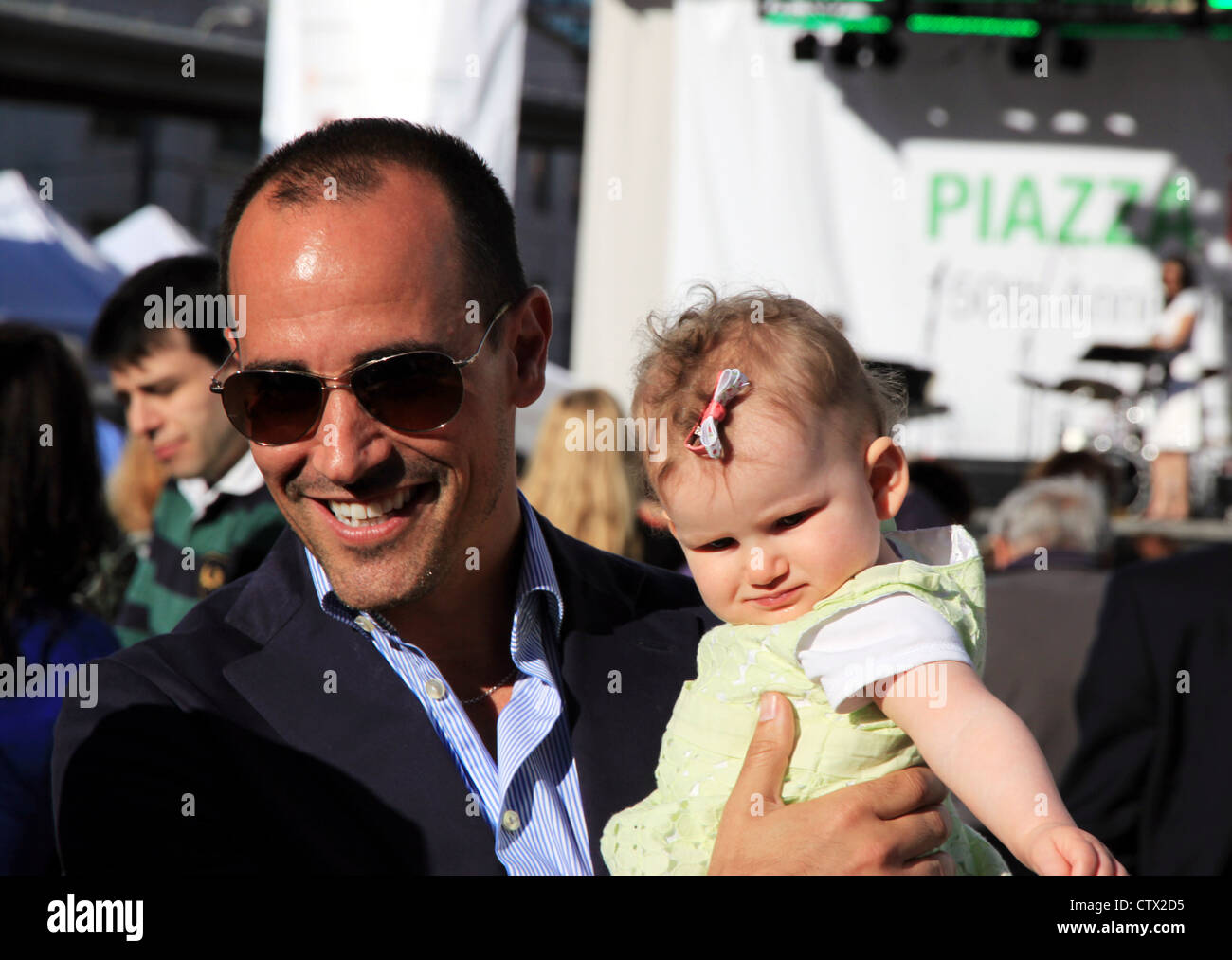 David Rocco Modelling David Rocco Holding a Kid Stock Photo - Alamy