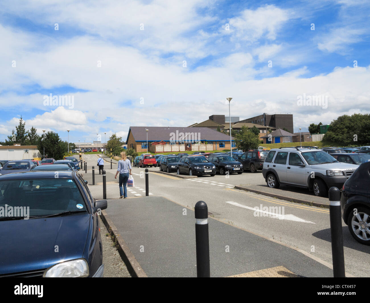 Cars parked in the overflow car park at Ysbyty Gwynedd Hospital Betsi