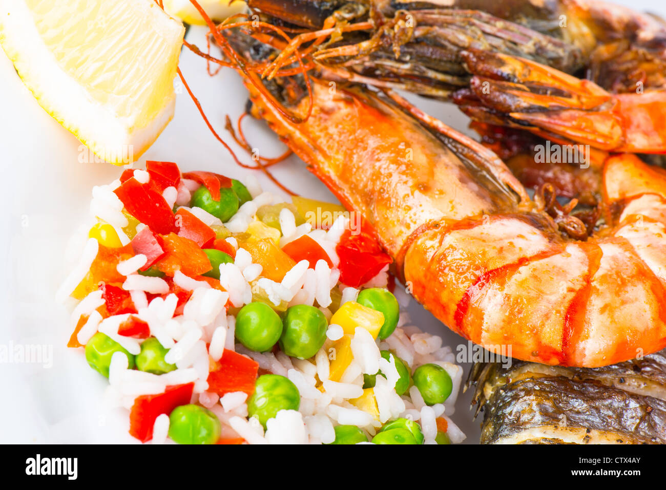 Giant prawns with sea bass fish Stock Photo - Alamy