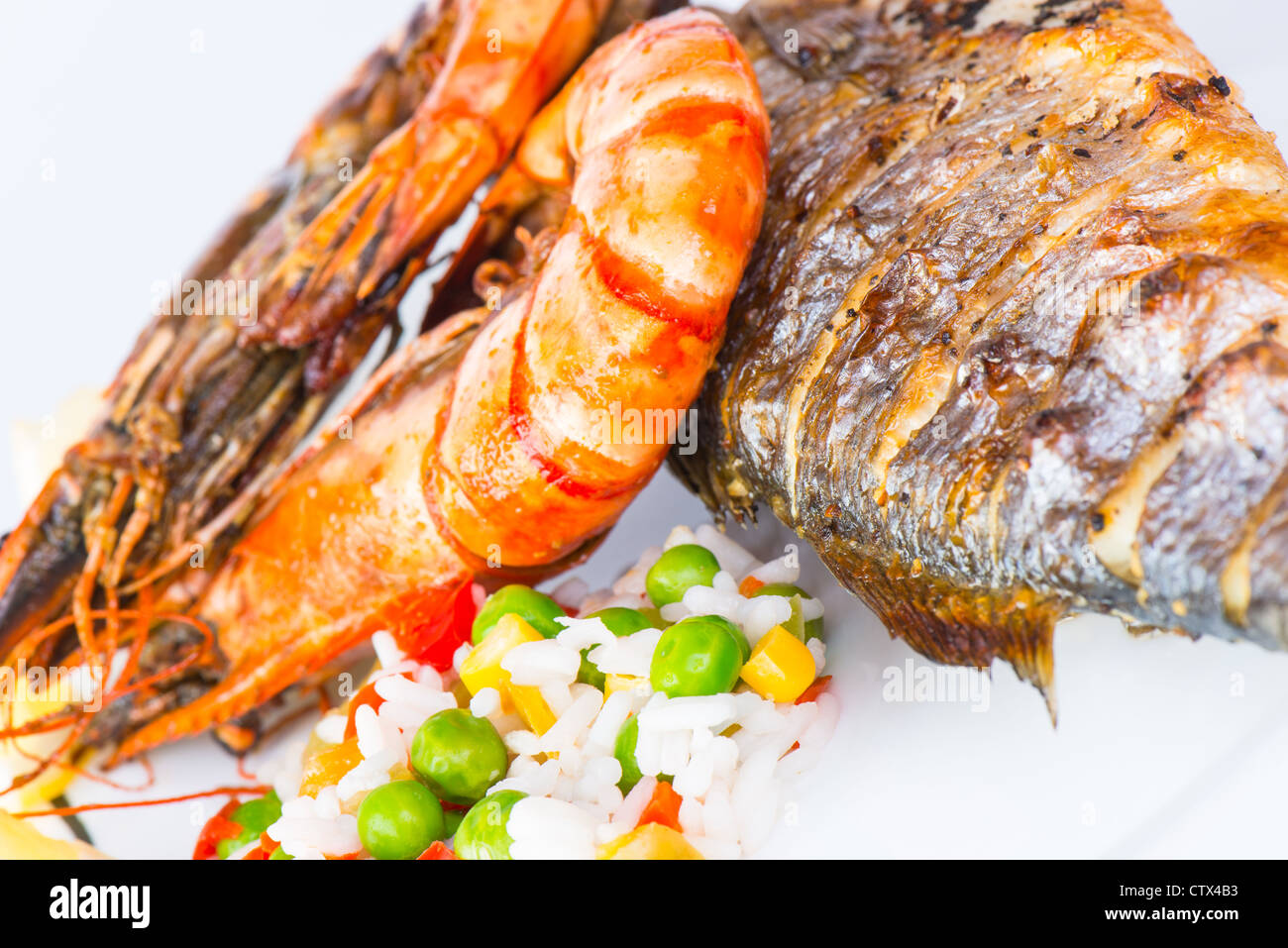 Giant prawns with sea bass fish Stock Photo - Alamy