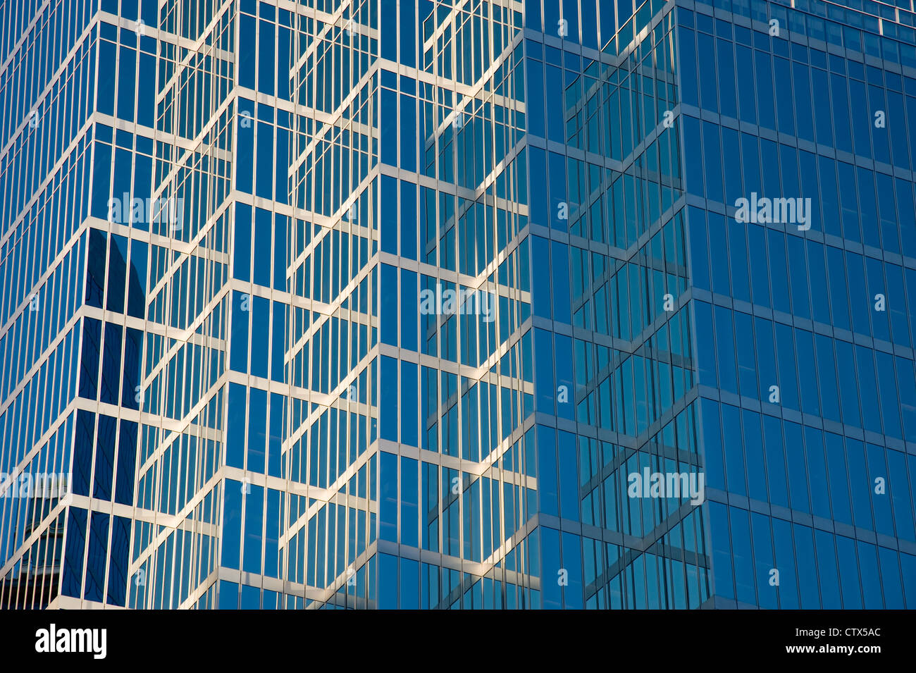 Glass facade of highrise office building Stock Photo