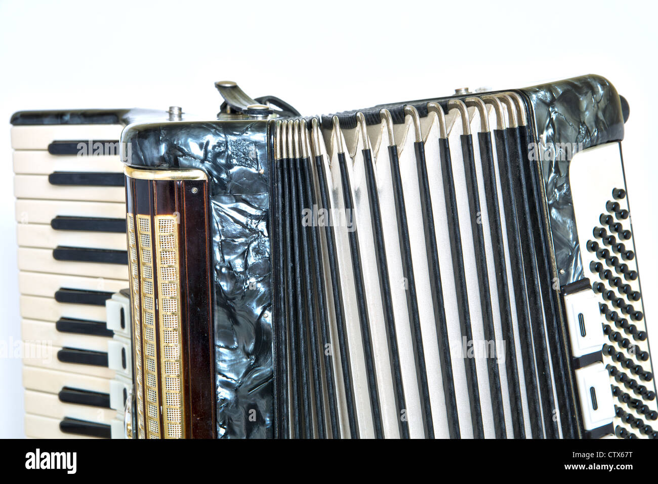 Shiny accordeon have white and black play button Stock Photo