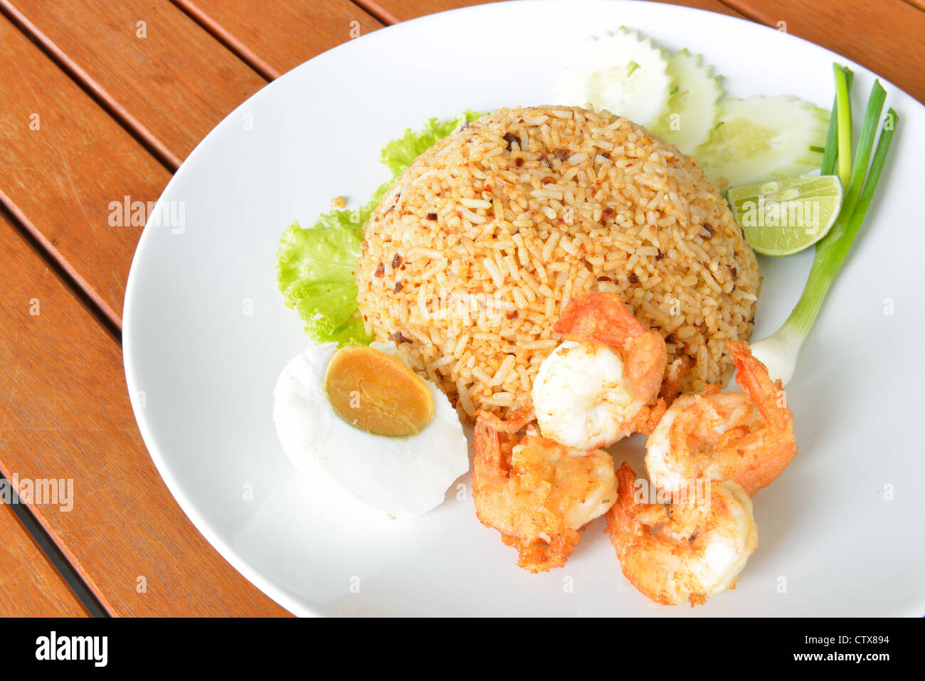 Thai food style call 'Fried rice with chili paste' served with fried shrimp and salted egg. Stock Photo