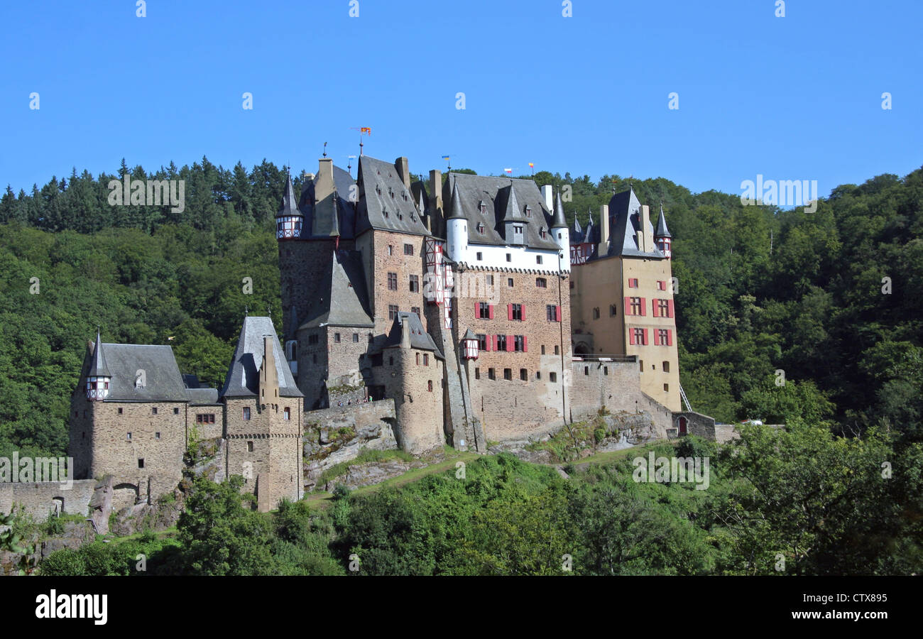 Castle Burg Eltz nestled amongst the hills and forest in the Eltz Valley Rhineland-Palatinate Germany Europe Stock Photo