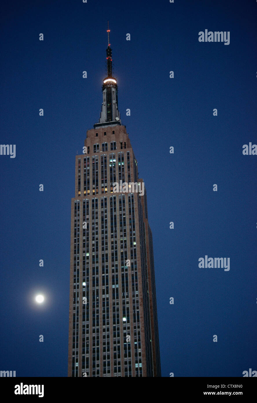 Empire State Building with full Moon Rising NYC USA skyscraper Stock ...